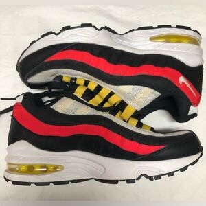 NIKE AIR MAX 95 US Size 5Y. Vibrant Kids Sneakers with Red and Black Accents.